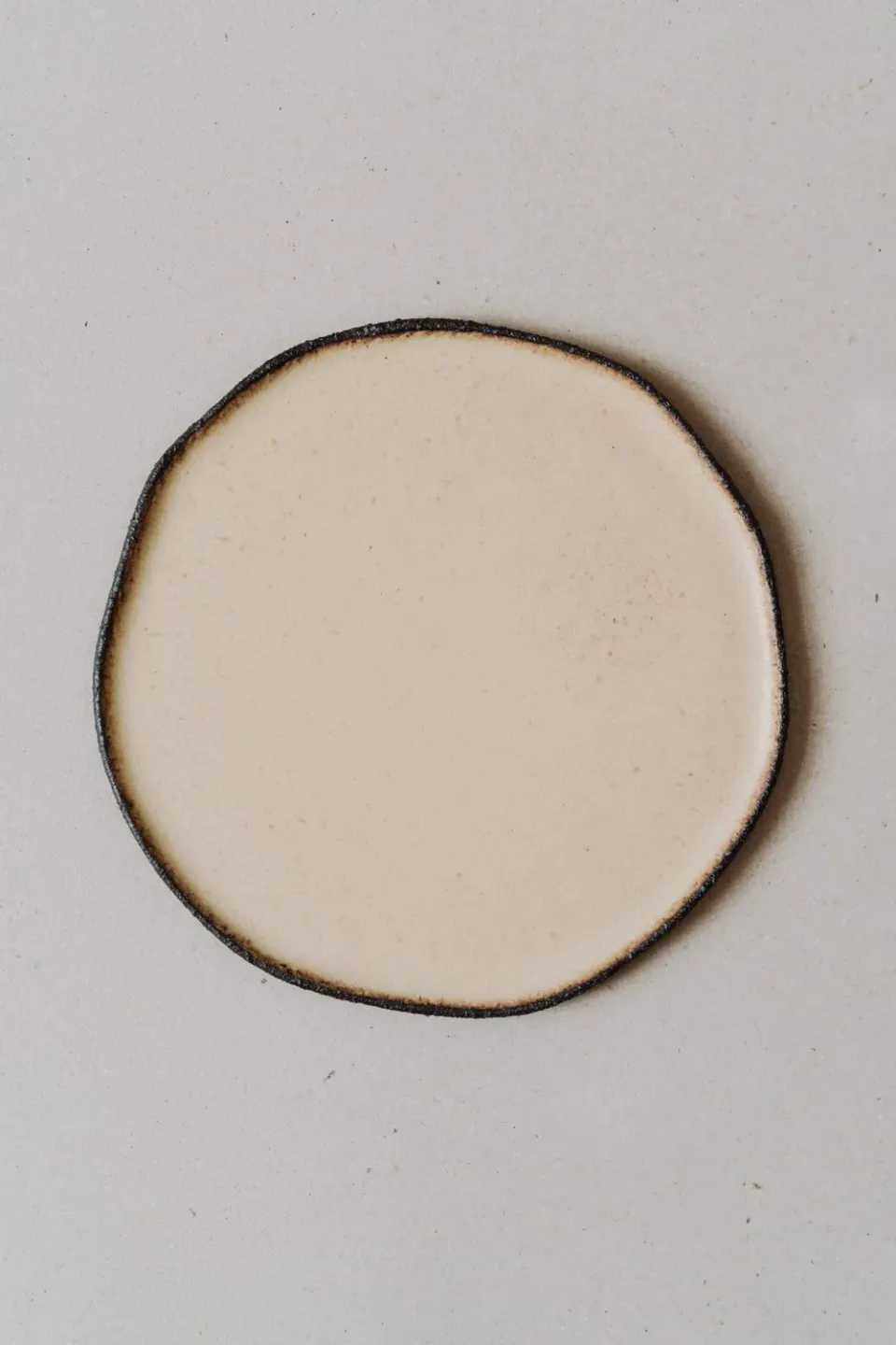 Poemi ROU/A piatto 27 cm gres nero terrazzo